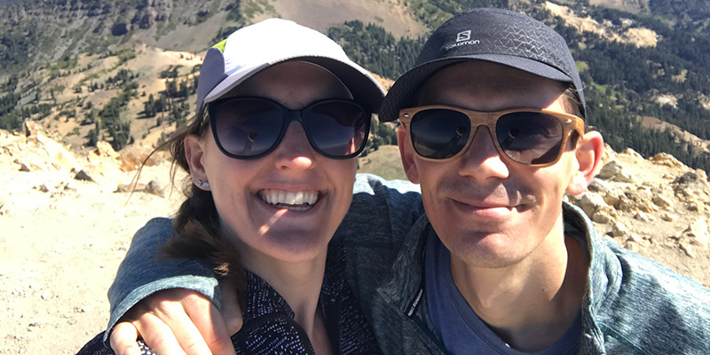 Tom Van Heeke ’12, right, and his wife, Lauren O’Hair ’12, are pictured on a peak in Lassen National Park in California last summer.